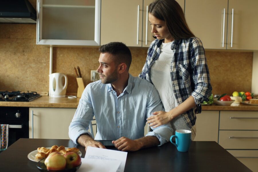 Couple sitting kitchen