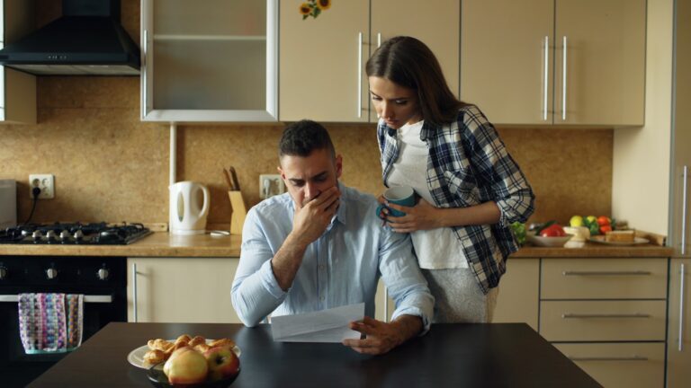 Couple sitting kitchen