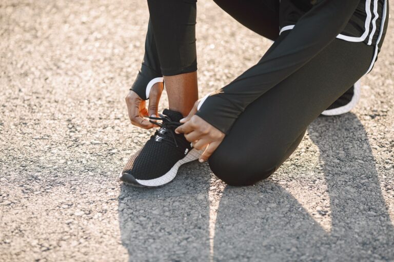 Person tying running