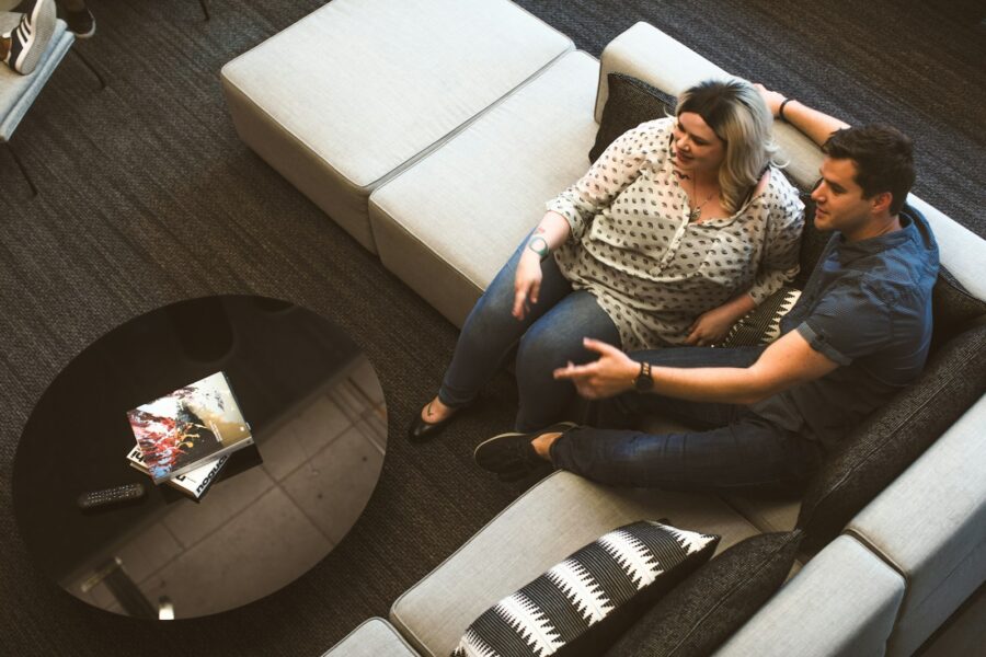 Couple sitting sofa