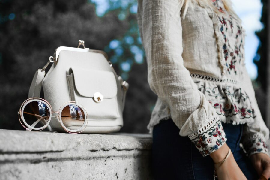 Woman accessorizing outfit
