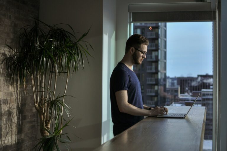 Person closing laptop