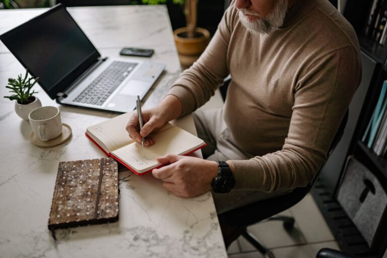 Person writing planner
