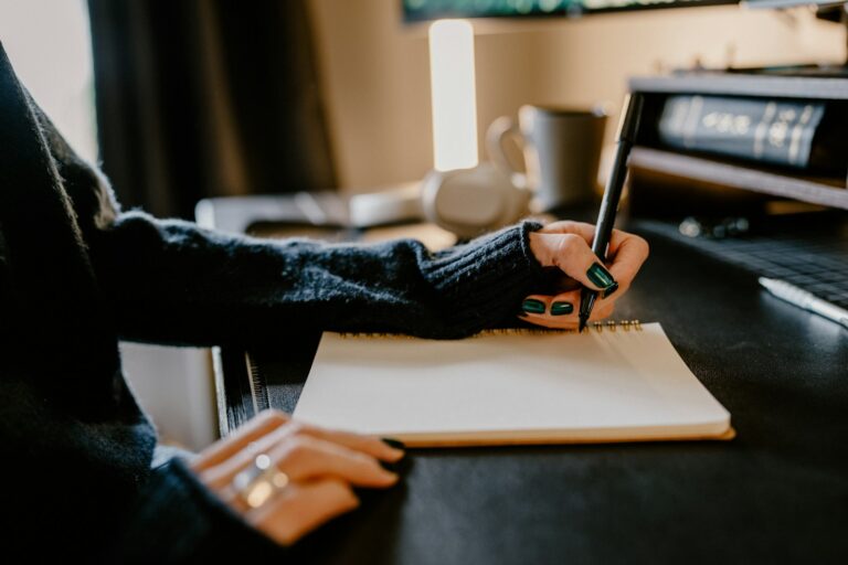 Person writing weekly