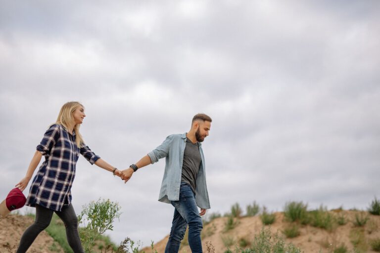 Couple holding hands