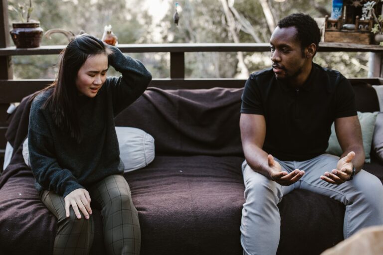 Couple talking sofa